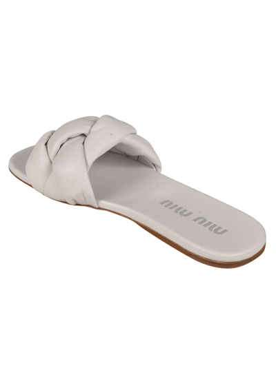 Shop Miu Miu Criss-cross Sliders In White