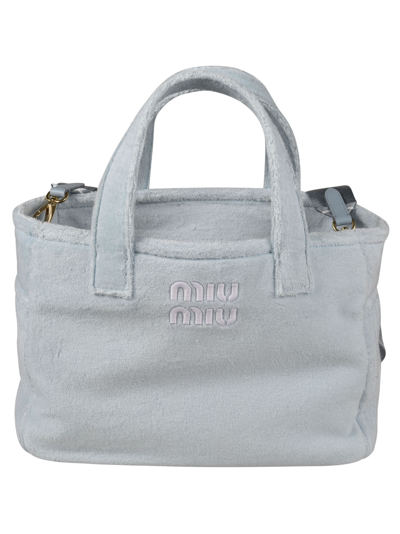 Shop Miu Miu Logo Embossed Top Handle Shopper Bag In Cielo