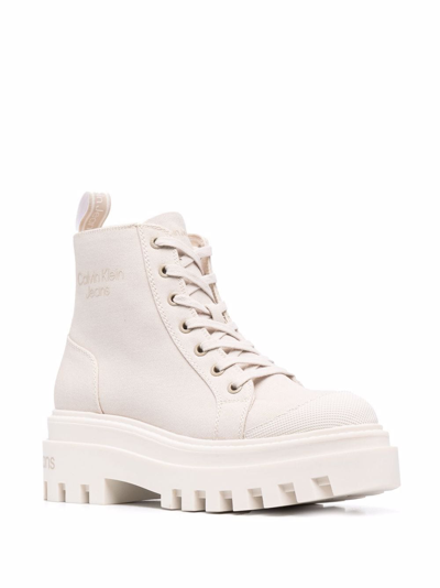 Shop Calvin Klein Canvas Lace-up Booties In Neutrals
