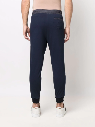 Shop Etro Logo-embossed Joggers In Blue