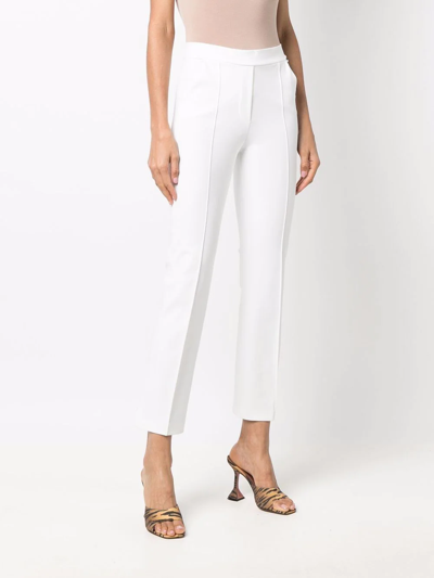 Shop Le Petite Robe Di Chiara Boni Pressed-crease Slip-on Cropped Trousers In White