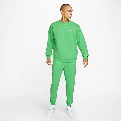 Shop Nike Sportswear Club Fleece Cuffed Jogger Pants In Light Green Spark/light Green Spark/white
