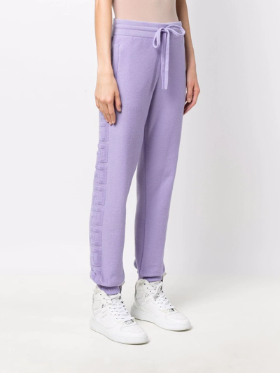 Shop Versace Drawstring Knitted Track Pants In Violett