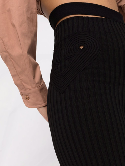 Andreädamo Ribbed-knit Bootcut Trousers In Schwarz