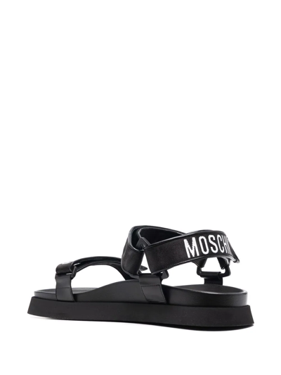 Shop Moschino Logo-print Touch-strap Sandals In Schwarz