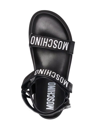 Shop Moschino Logo-print Touch-strap Sandals In Schwarz