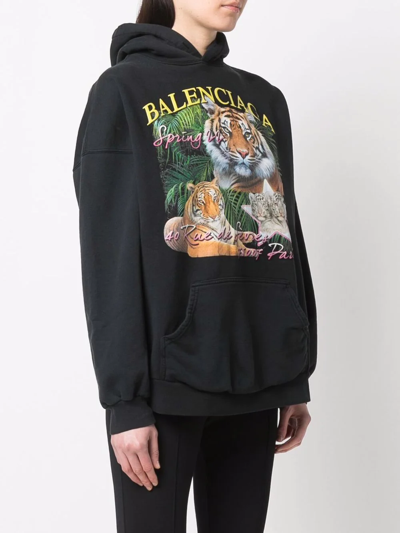 Shop Balenciaga Tiger Logo Print Hoodie In Schwarz