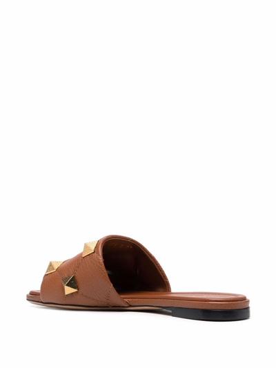 Shop Valentino Roman Stud Leather Sandals In Brown
