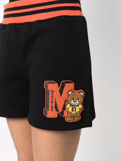 Shop Moschino Logo-print Cotton Shorts In Schwarz