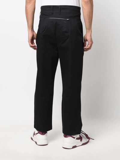 Shop Li-ning Logo-print Straight-leg Trousers In Schwarz
