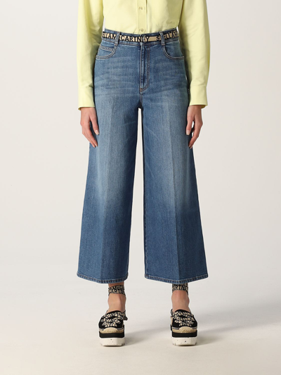 Shop Stella Mccartney Cropped Jeans In Washed Denim In 牛仔布