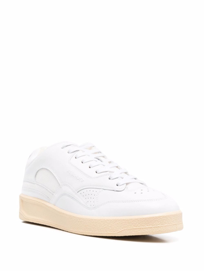 Shop Jil Sander Logo-embossed Low-top Sneakers In White