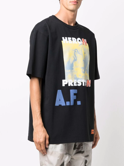Shop Heron Preston Graphic-print Cotton T-shirt In Schwarz