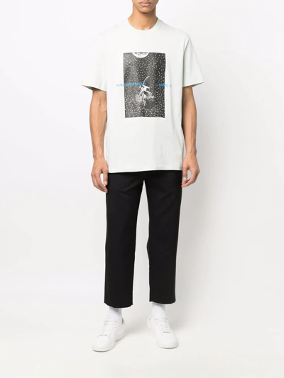 Shop Oamc Graphic-print Cotton T-shirt In Grün