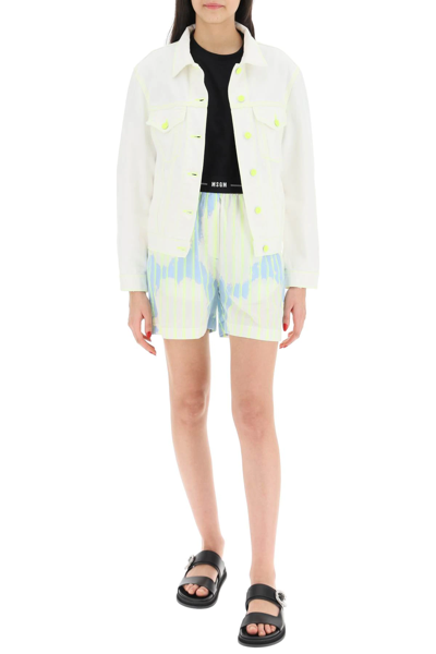 Shop Msgm Denim Jacket With Fluorescent Stiching In White,yellow