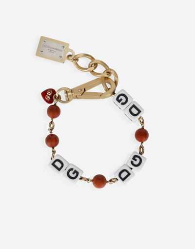 Shop Dolce & Gabbana Bracelet With Dg Logo Dice In Gold
