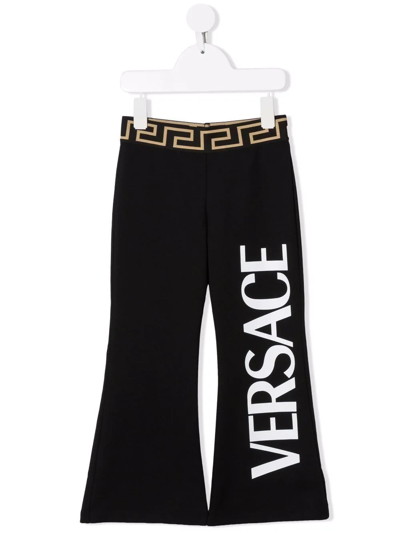 Shop Versace Greca-waistband Logo Trousers In Black