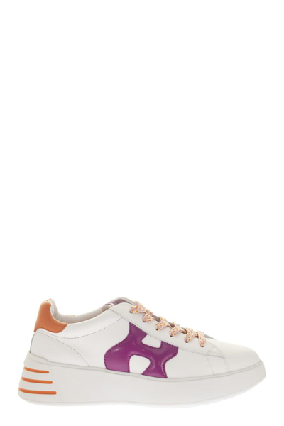Shop Hogan H564 Rebel - Sneakers In White
