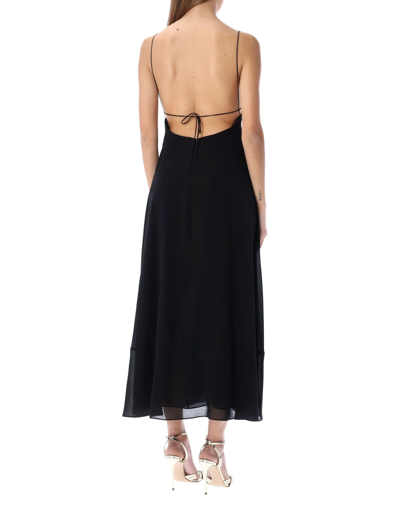 Shop Saint Laurent Long Backless Dress In Black
