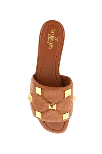 Shop Valentino Garavani Roman Stud Leather Slides In Brown