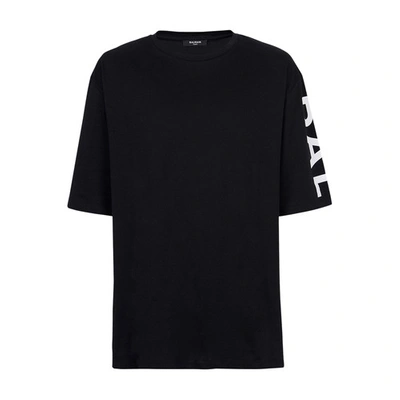 Shop Balmain Oversized Cotton T-shirt With Logo Print In Noir Blanc