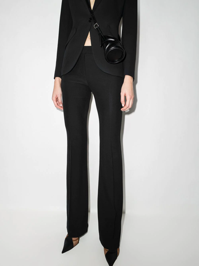 Alexander Mcqueen Grain De Poudre Wool Flared Pants In Black