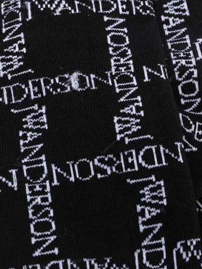 Shop Jw Anderson Logo-knit Socks In Black