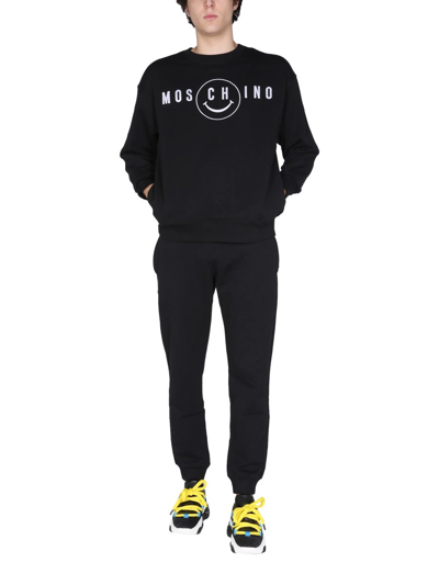 Shop Moschino "smile" Sweatshirt In Black