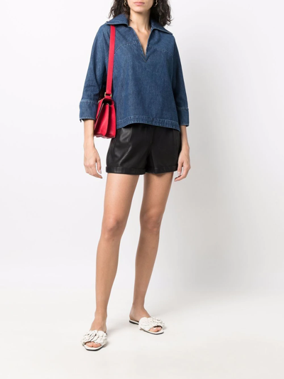 VLOGO 标牌牛仔罩衫