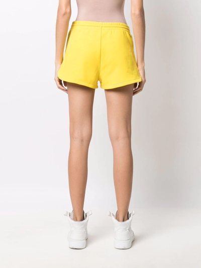 Shop Moschino Logo-print Track Shorts In Yellow