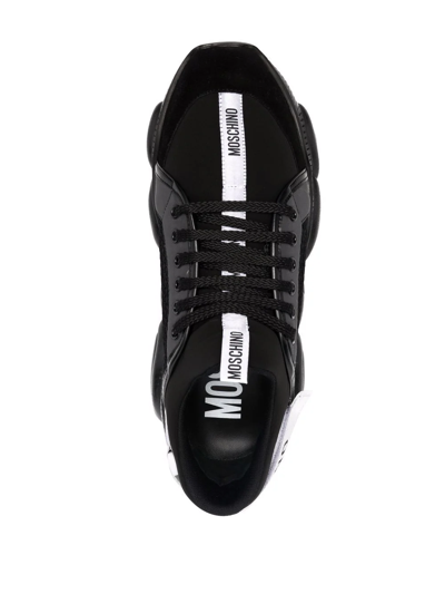 Shop Moschino Logo-strap Teddy-sole Sneakers In Black