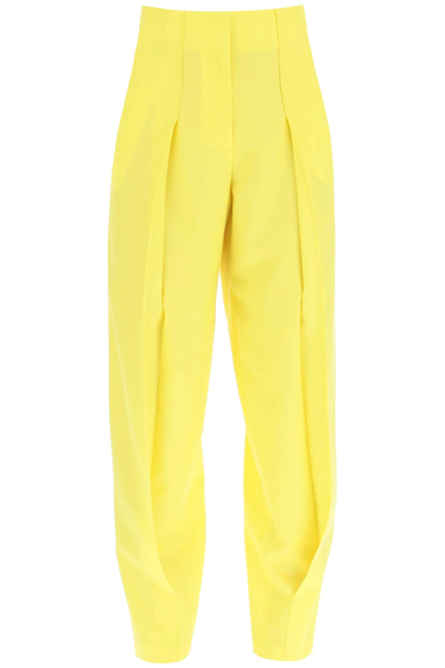 Shop Loewe Carrot Fit Wool Trousers In Yellow