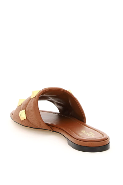 Shop Valentino Roman Stud Leather Slides In Brown