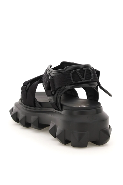 Shop Valentino Trackstud Sandals In Black