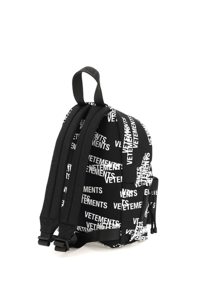 Shop Vetements Logo Print Mini Backpack In Black,white
