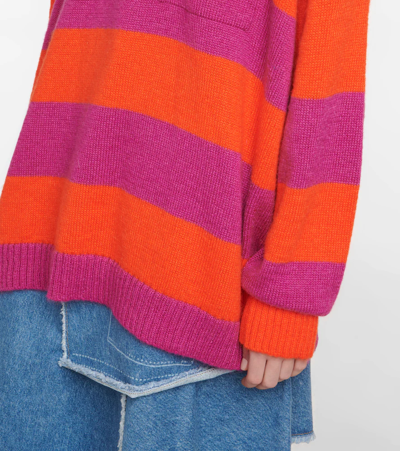 Shop Jw Anderson Striped Sweater In Pink/red