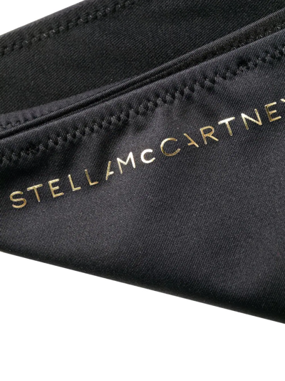Shop Stella Mccartney Logo-plaque Low Rise Bikini Bottoms In Schwarz