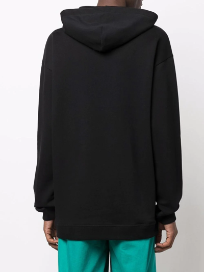 Shop Qasimi Graphic Print Hoodie In Schwarz