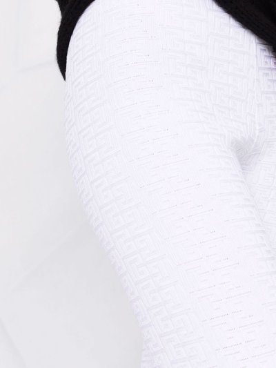 Shop Balmain Monogram-pattern Knitted Leggings In Weiss