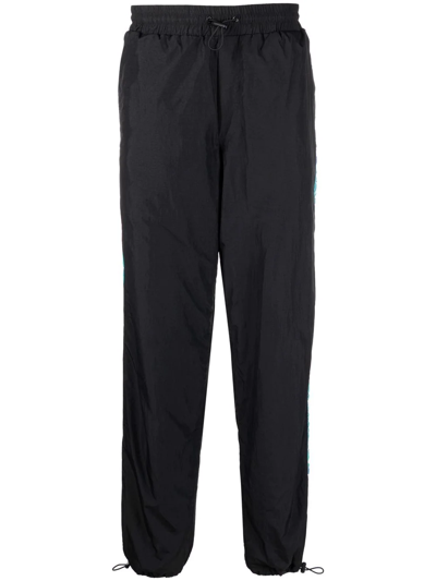 Shop Versace Jeans Couture Logo-tape Drawstring Track Pants In Schwarz