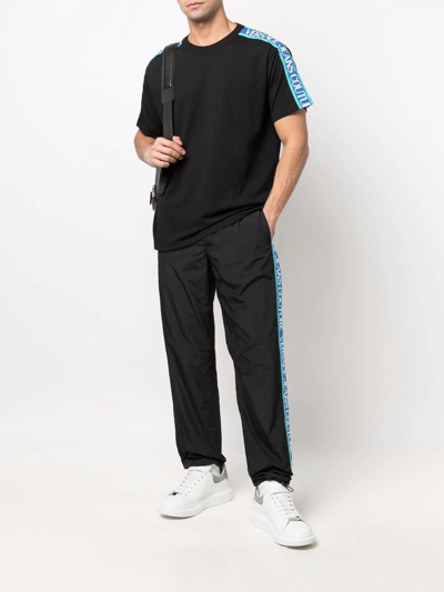 Shop Versace Jeans Couture Logo-tape Drawstring Track Pants In Schwarz