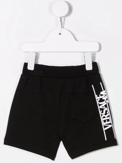 Shop Versace Logo-print Cotton Shorts In Black
