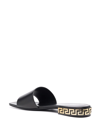 Shop Versace Greca-detail Leather Sandals In Black