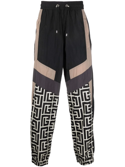 Balmain Jogging Pants With Maxi Monogram Logo Print In Schwarz