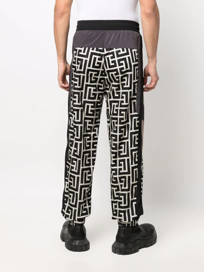 Balmain Jogging Pants With Maxi Monogram Logo Print In Schwarz