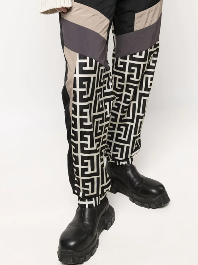 Balmain Jogging Pants With Maxi Monogram Logo Print In Schwarz