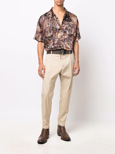 Shop Dsquared2 Cropped Tapered Chinos In Neutrals