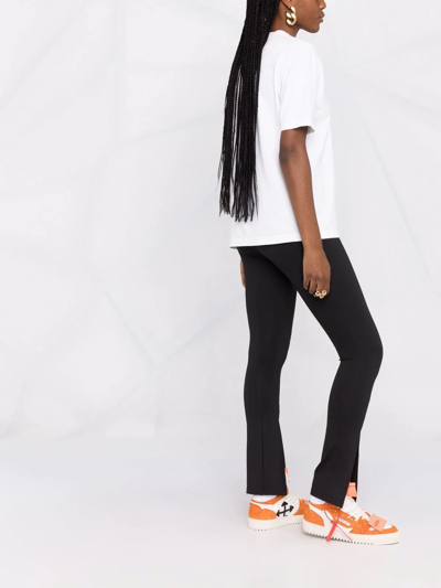 Shop Adidas Originals Skinny-cut Flared Slit Trousers In Black