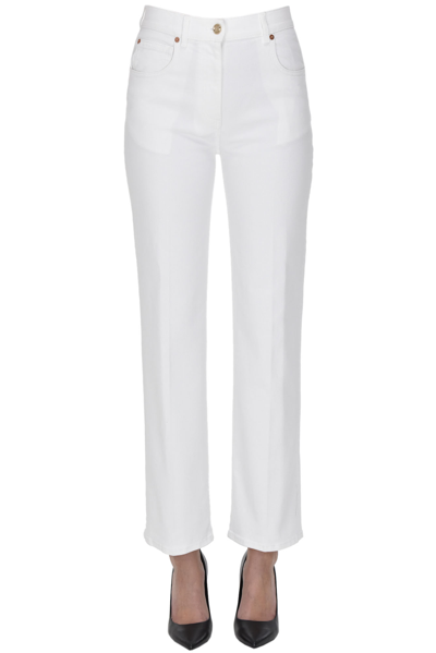 Shop Valentino V Gold Jeans In White