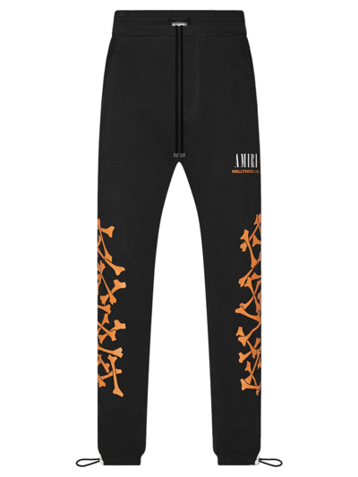 Shop Amiri Bones Sweatpants Black And Orange
